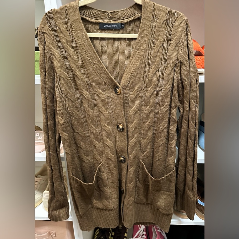 Chocolate Brown button up Cardigan size M
Gently Worn once.